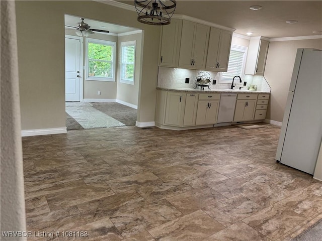 1304 S Elm St, Paris, AR 72855 - kitchen featuring white appliances, ornamental molding, tasteful backsplash, a sink, and a ceiling fan
