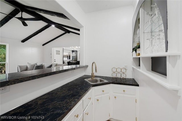 1910 S 46th St, Fort Smith, AR 72903 - kitchen with a sink, white cabinetry, dark stone countertops, and open floor plan