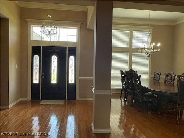 1801 Fianna Way, Fort Smith, AR 72908 - foyer entrance with a chandelier, wood-type flooring, baseboards, and ornamental molding