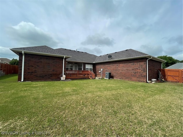 1801 Fianna Way, Fort Smith, AR 72908 - rear view of house featuring central AC unit, a wooden deck, brick siding, and roof with shingles