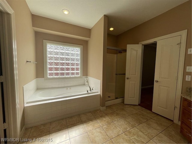 1801 Fianna Way, Fort Smith, AR 72908 - bathroom with a bath, a stall shower, tile patterned floors, vanity, and recessed lighting