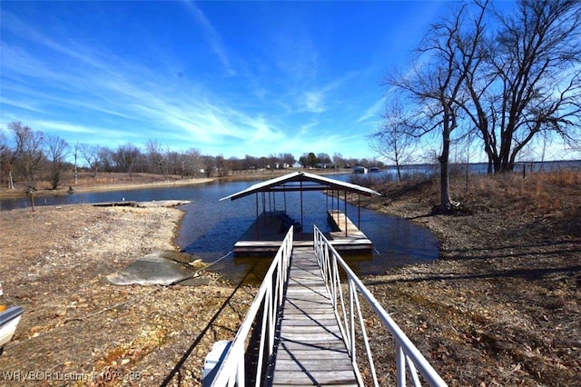 view of dock with a water view