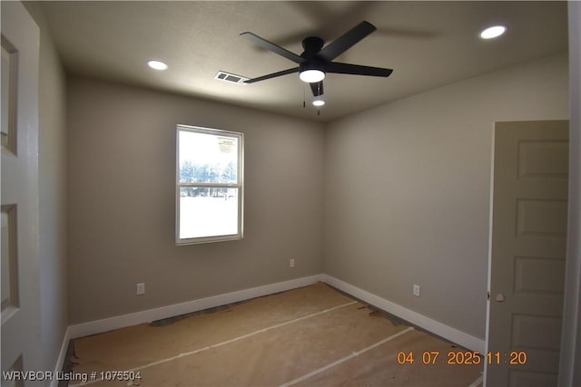 unfurnished bedroom featuring a tray ceiling, visible vents, and recessed lighting