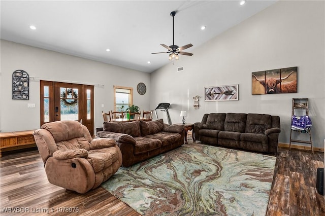 living area with wood finished floors, visible vents, high vaulted ceiling, recessed lighting, and ceiling fan