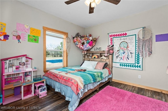 bedroom featuring wood finished floors and ceiling fan