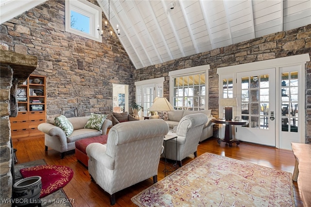 living room featuring high vaulted ceiling, beam ceiling, dark hardwood / wood-style floors, and wood ceiling