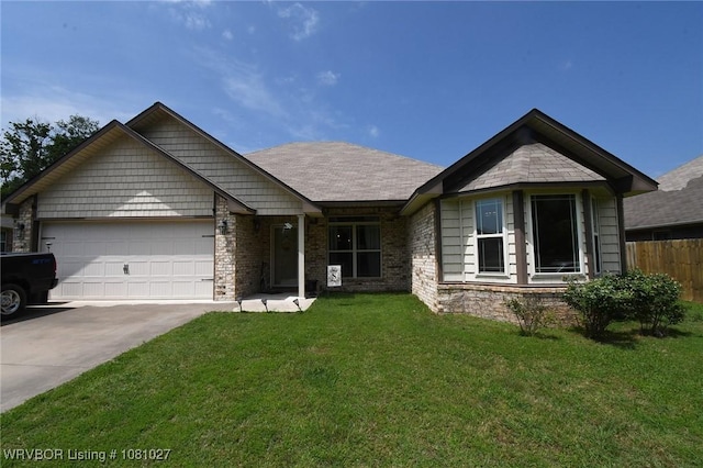 114 Stone Dr, Roland, OK 74954 - view of front of property featuring a garage, concrete driveway, and stone siding