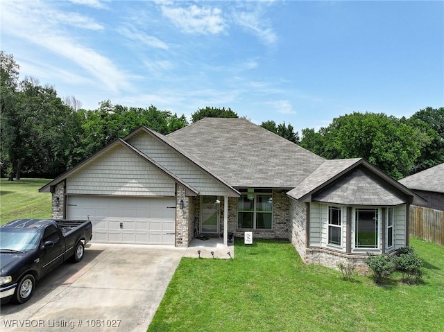 114 Stone Dr, Roland, OK 74954 - view of front of house with an attached garage and driveway