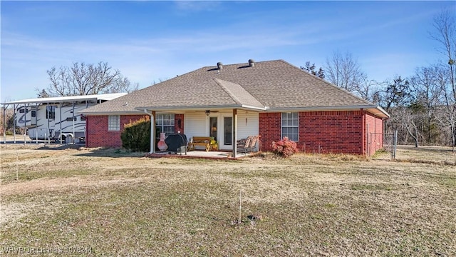 rear view of house with ceiling fan