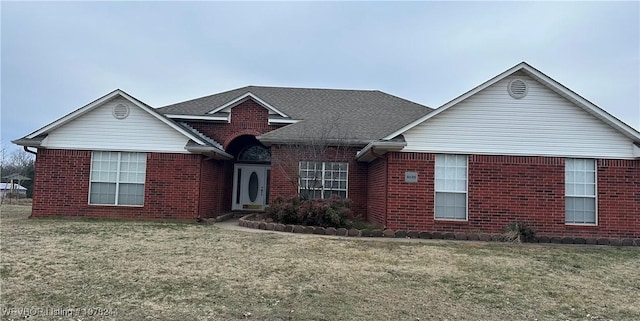 view of front of house with a front lawn