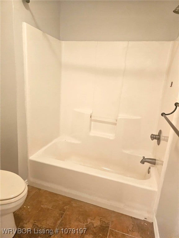 full bathroom featuring shower / bathtub combination and toilet