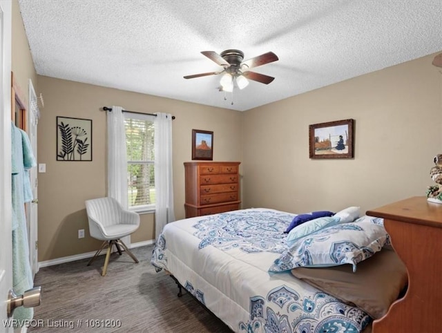 42735 Timber Ridge Rd, Howe, OK 74940 - bedroom featuring a textured ceiling, baseboards, ceiling fan, and carpet flooring