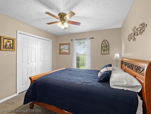 42735 Timber Ridge Rd, Howe, OK 74940 - bedroom featuring a closet, wood finished floors, a ceiling fan, a textured ceiling, and baseboards