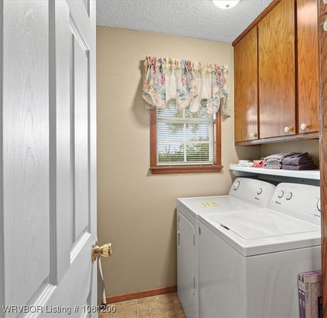 42735 Timber Ridge Rd, Howe, OK 74940 - washroom featuring independent washer and dryer, cabinet space, baseboards, and a textured ceiling