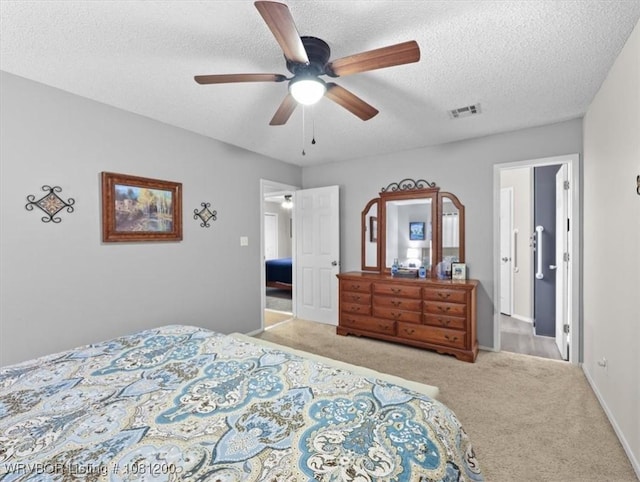 42735 Timber Ridge Rd, Howe, OK 74940 - bedroom featuring carpet, a textured ceiling, ceiling fan, and baseboards