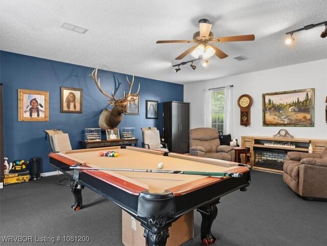 42735 Timber Ridge Rd, Howe, OK 74940 - game room with track lighting, carpet, a textured ceiling, a ceiling fan, and billiards table