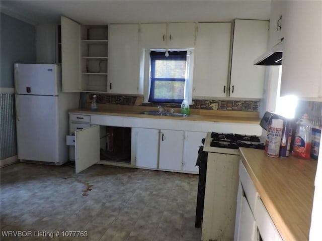 kitchen featuring white appliances, ventilation hood, white cabinetry, and sink