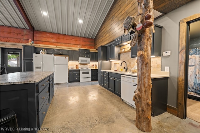 465 Boyd Dr, New Blaine, AR 72851 - kitchen featuring white appliances, concrete floors, tasteful backsplash, light countertops, and recessed lighting
