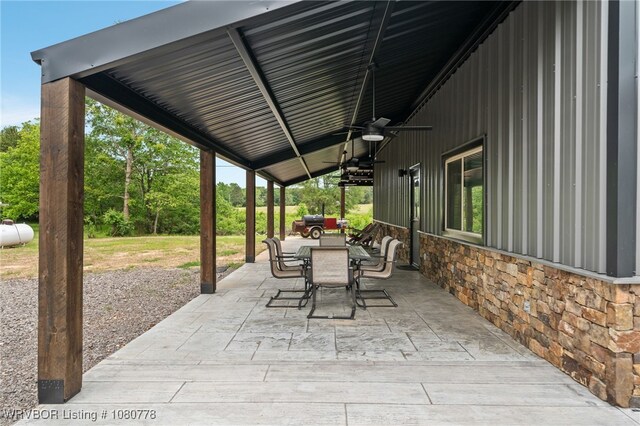 465 Boyd Dr, New Blaine, AR 72851 - view of patio / terrace with outdoor dining area and ceiling fan