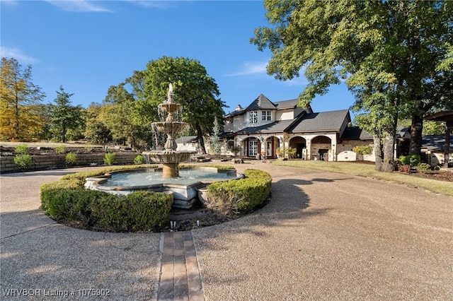 view of french country inspired facade