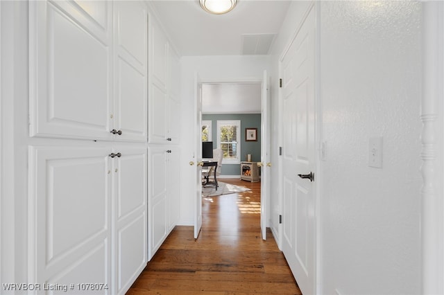 hallway featuring dark wood-type flooring