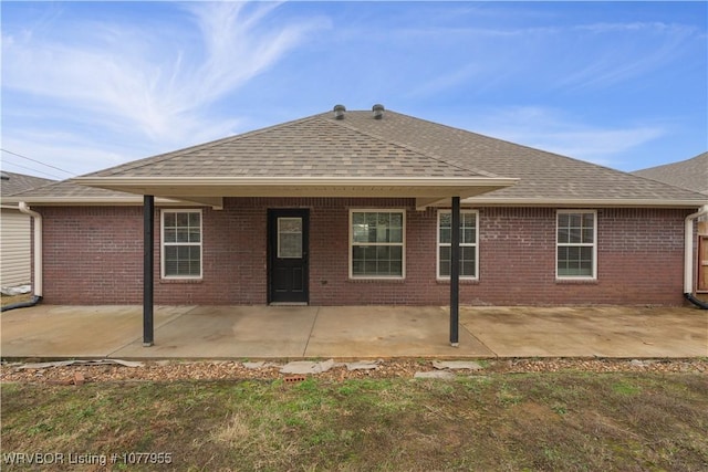 rear view of property featuring a patio