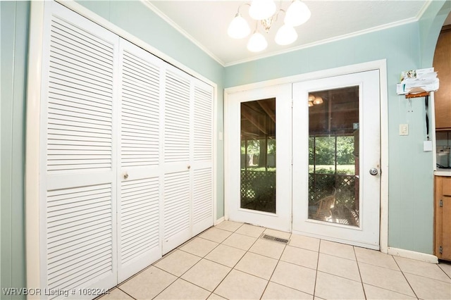 4300 Tilles Ave, Fort Smith, AR 72903 - doorway to outside featuring ornamental molding, a chandelier, and light tile patterned flooring