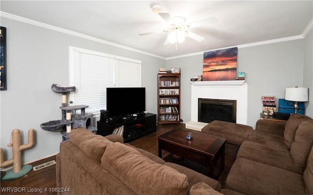 4300 Tilles Ave, Fort Smith, AR 72903 - living area with wood finished floors, crown molding, ceiling fan, and a glass covered fireplace