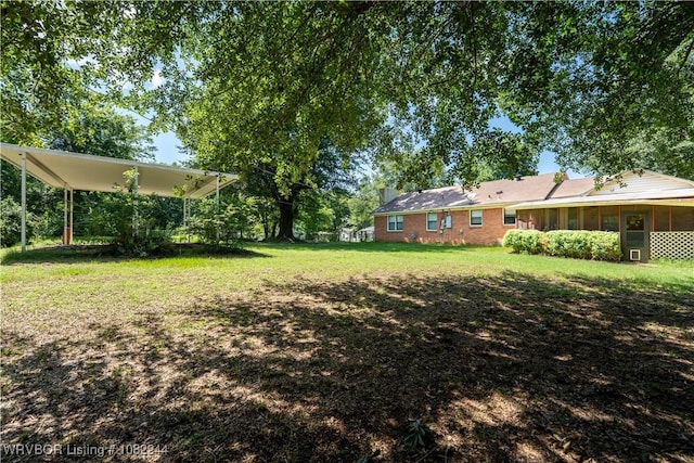 4300 Tilles Ave, Fort Smith, AR 72903 - view of green lawn with an attached carport