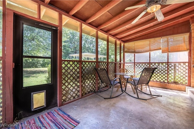 4300 Tilles Ave, Fort Smith, AR 72903 - unfurnished sunroom with ceiling fan, vaulted ceiling, plenty of natural light, and outdoor dining space