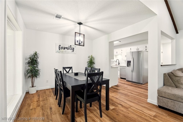 9010 Skypark Dr, Fort Smith, AR 72903 - dining room with light wood-style flooring and baseboards