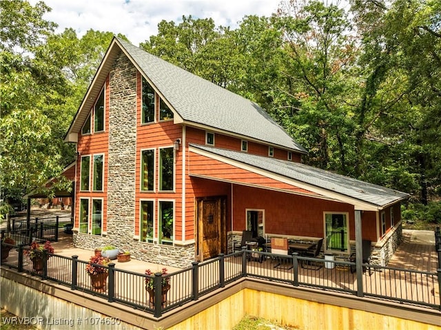 rear view of property with a patio area