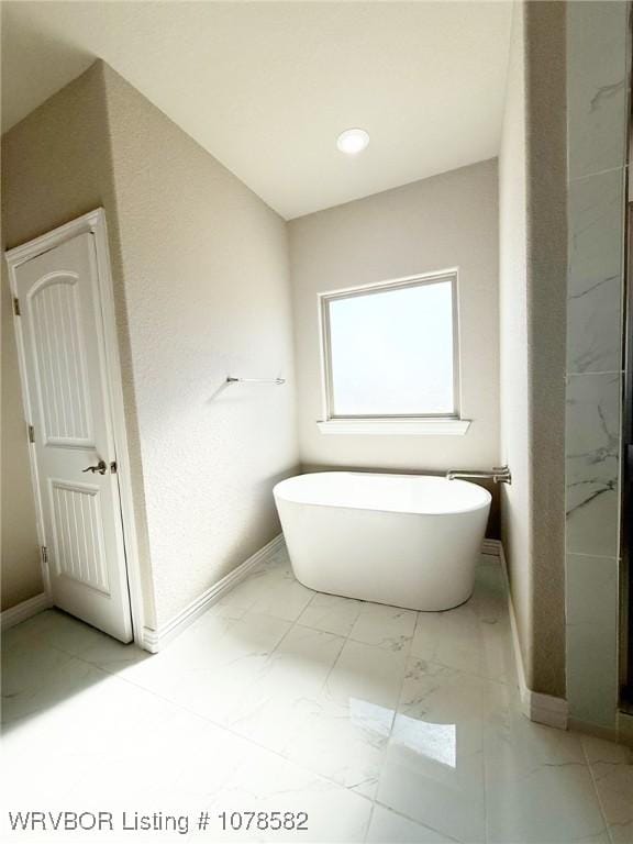 bathroom featuring a bathing tub