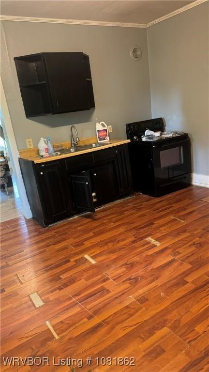 1101 N 6th St Unit A & B, Fort Smith, AR 72901 - living room with light wood-style floors and crown molding