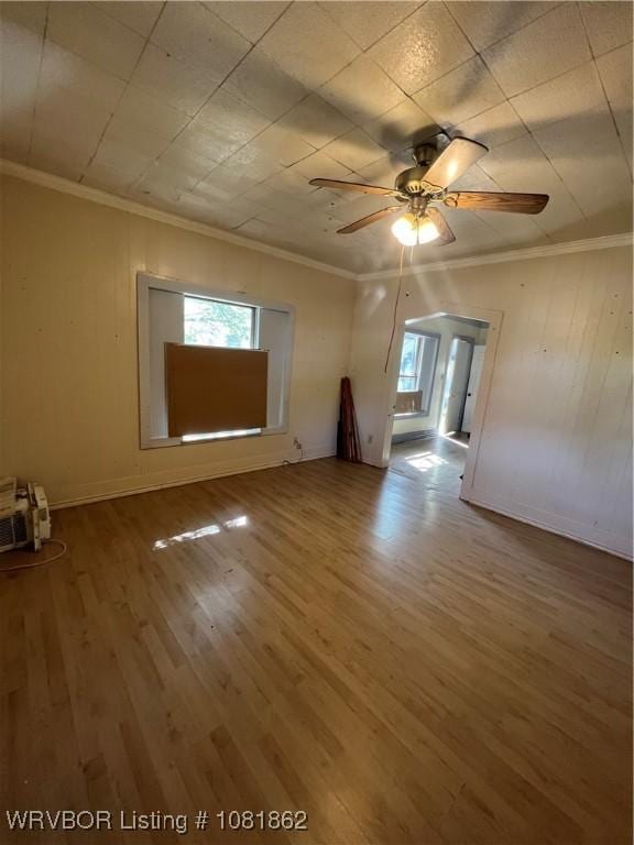 1101 N 6th St Unit A & B, Fort Smith, AR 72901 - unfurnished room with crown molding, wood finished floors, and ceiling fan