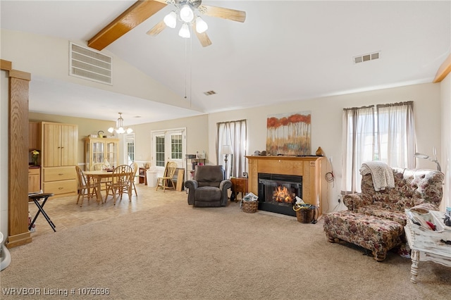 living room featuring ceiling fan with notable chandelier, beam ceiling, light carpet, and high vaulted ceiling