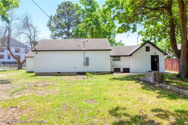 3305 Spradling Ave, Fort Smith, AR 72904 - rear view of house with central AC, crawl space, and roof with shingles