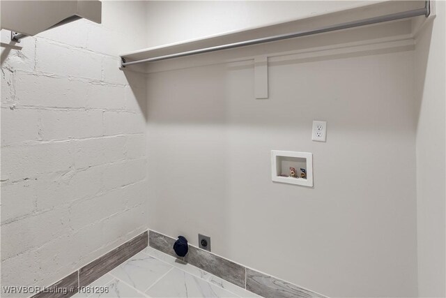 3305 Spradling Ave, Fort Smith, AR 72904 - laundry room with hookup for a washing machine, electric dryer hookup, marble finish flooring, and concrete block wall