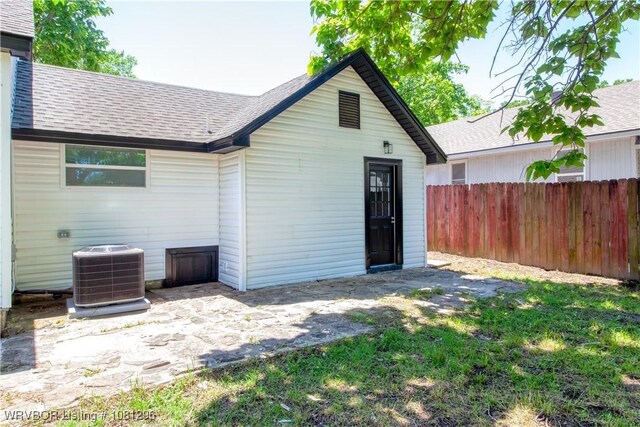 3305 Spradling Ave, Fort Smith, AR 72904 - back of house featuring central air condition unit and a shingled roof