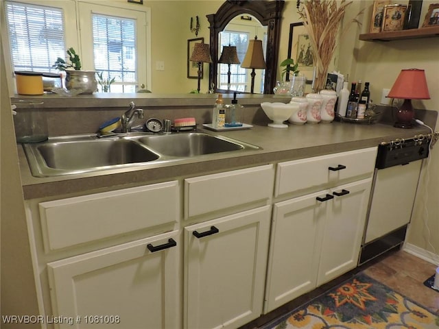 2016-2018 S V St, Fort Smith, AR 72901 - kitchen featuring a sink, white cabinets, and white dishwasher