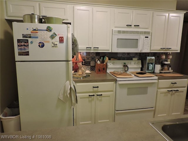 2016-2018 S V St, Fort Smith, AR 72901 - kitchen featuring white appliances, tasteful backsplash, white cabinetry, and light countertops