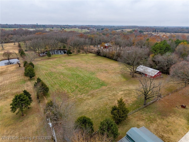 birds eye view of property featuring a rural view