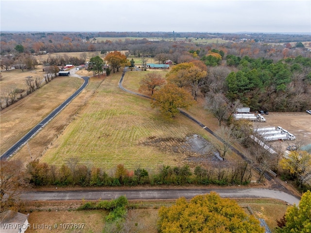 birds eye view of property featuring a rural view