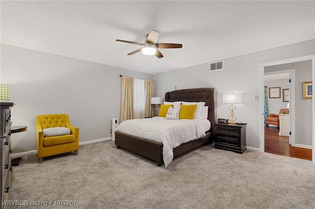 carpeted bedroom featuring ceiling fan