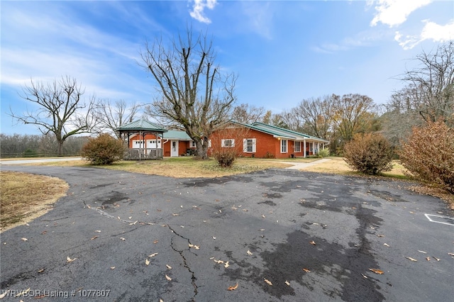 view of front of property with a gazebo