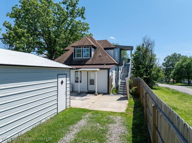 2101 Birnie Ave, Fort Smith, AR 72904 - back of property with a patio and stairway