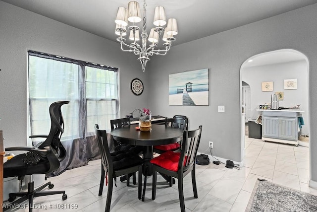 2101 Birnie Ave, Fort Smith, AR 72904 - dining room with arched walkways, light marble finish floors, and a chandelier