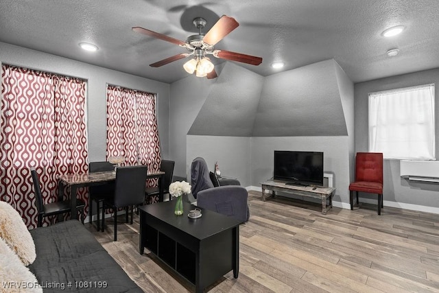 2101 Birnie Ave, Fort Smith, AR 72904 - living area with a textured ceiling, a ceiling fan, wood finished floors, baseboards, and recessed lighting