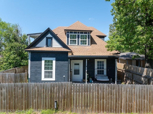 2101 Birnie Ave, Fort Smith, AR 72904 - traditional home featuring roof with shingles and a fenced front yard