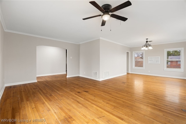 unfurnished living room with crown molding, ceiling fan with notable chandelier, and light hardwood / wood-style floors